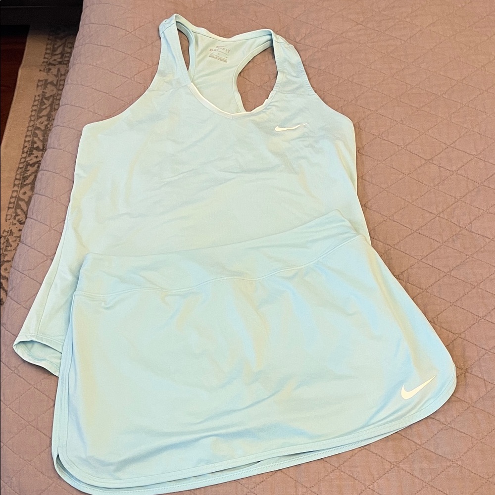 Nike Women's Sky Blue Racerback Tank Top and matching skirt set.